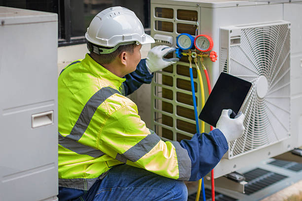 Professional Hvac technician working in Yukon, MO